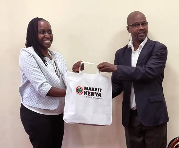 Jane Madumadu Tanui (Left), Principal Officer, Stakeholder Engagement, Kenya Export Promotion and Branding Agency (KEPROBA), presents a gift to Johanna Kibet of the Institute's Trade Mark Division, when the Agency's officers visited KIPI Centre, Kabarsiran Avenue, Off Waiyaki Way, Nairobi on 30th November, 2023.