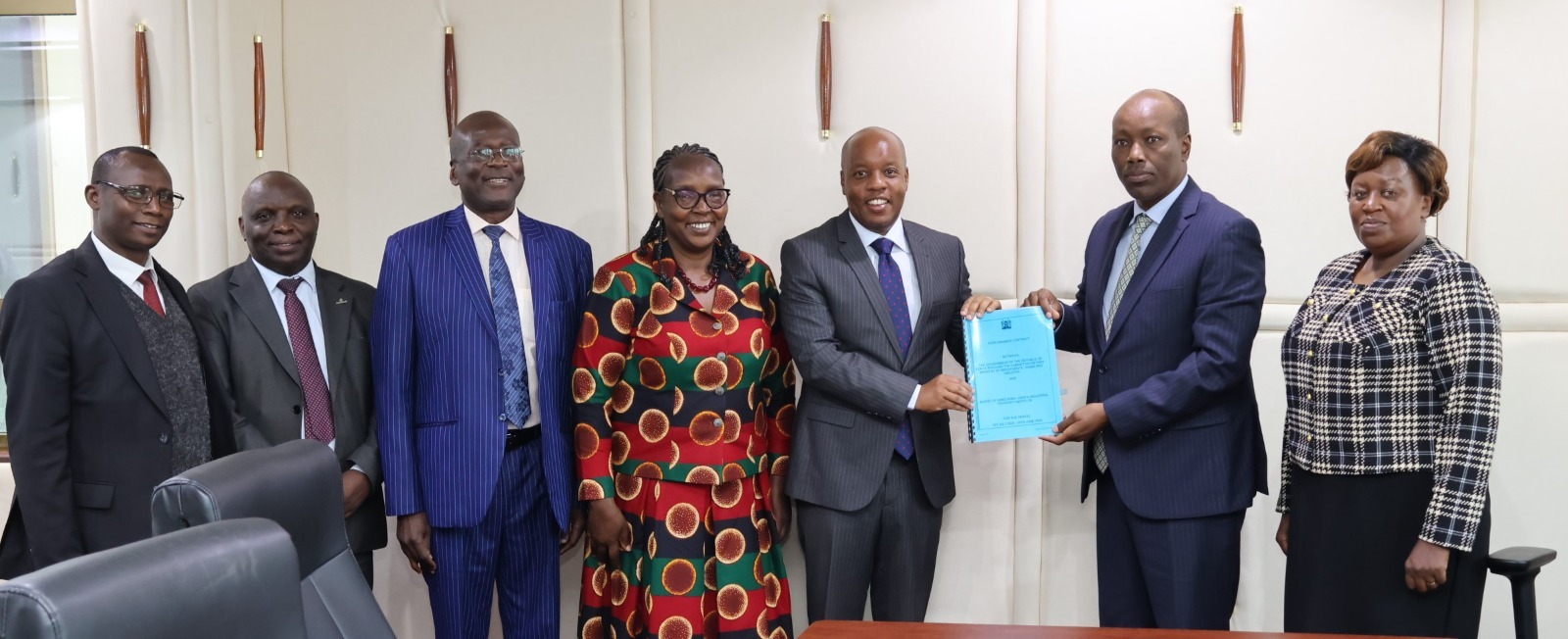 Caption: KIPI Board Chairman, Allan Kosgey (3rd Right) receives a copy of the signed Performance Contract from CS Lee Kinyanjui during the ceremony. Others in the picture are PS Regina Ombam (Centre), Prof. Erastus Gatebe (2nd Left),  Industrialization Secretary, Juliana Yako (Right), PAS, Prime CS' Office, John Onyango 3rd Left, MD, and Stephen Ngeno (Left), DMD-Technical Services.