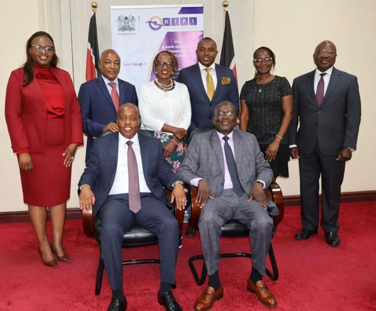 Photo Caption: Allan Kosgey (Seated Left), the KIPI Board Chairman, Board Members (Standing Left to Right), Aileen Aluso Ingati, Richard Muteti, Victoria Kaigai, Lawrence Njenga, Evelyn Mbaabu and Prof Elijah Omwenga. In the picture also is Managing Director, John Onyango (Seated Right). 